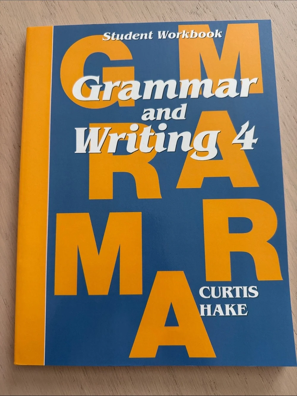 Grammar and Writing 4 Student Workbook by — Blue & Orange